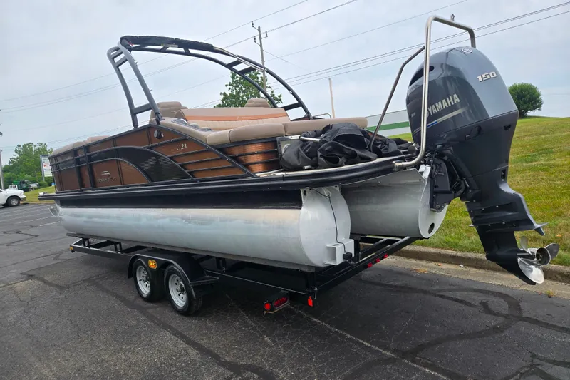 Slide: The Image of 2017 Bennington G 23 GSBA pontoon boat with Yamaha 150 engine on trailer. - 3