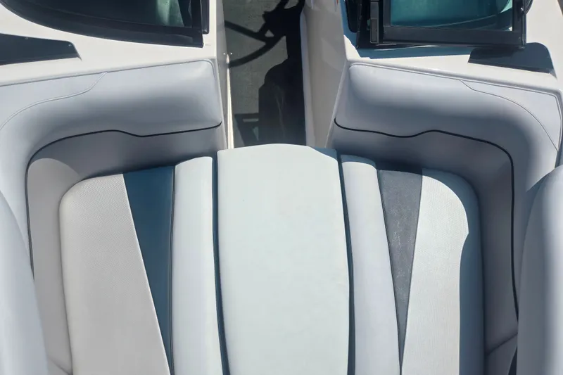Slide: The Image of 2012 Moomba Mojo 2.5 boat interior with sleek, cushioned seating design. - 17