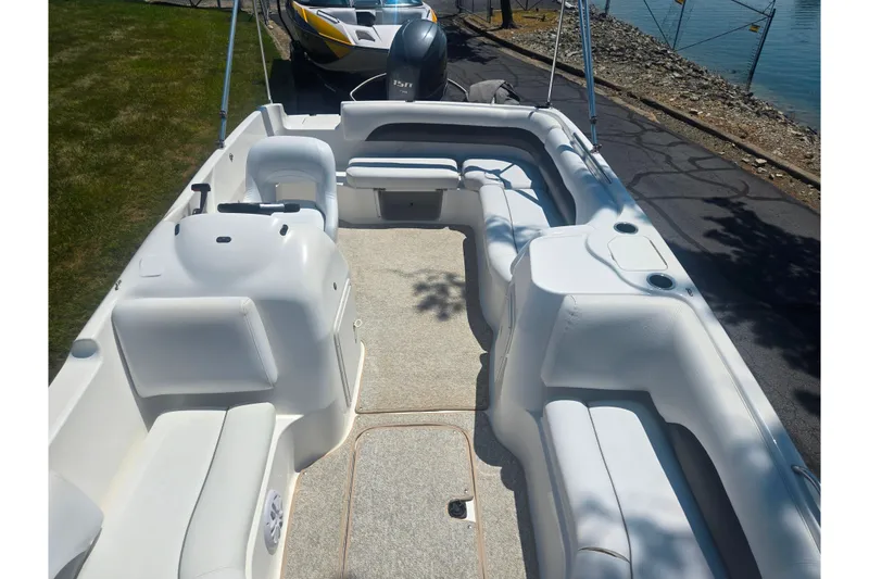 Slide: The Image of 2013 Hurricane SunDeck Sport 188 OB boat interior with spacious seating and clean design. - 11