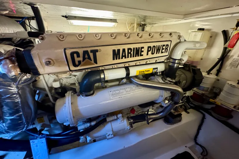 Slide: The Image of Engine room of 2009 Riviera 45 Open Flybridge with CAT Marine Power engine. - 61