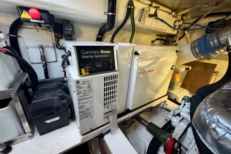 Slide: The Image of Engine room of 2009 Riviera 45 Open Flybridge with Cummins Onan marine generator. - 62