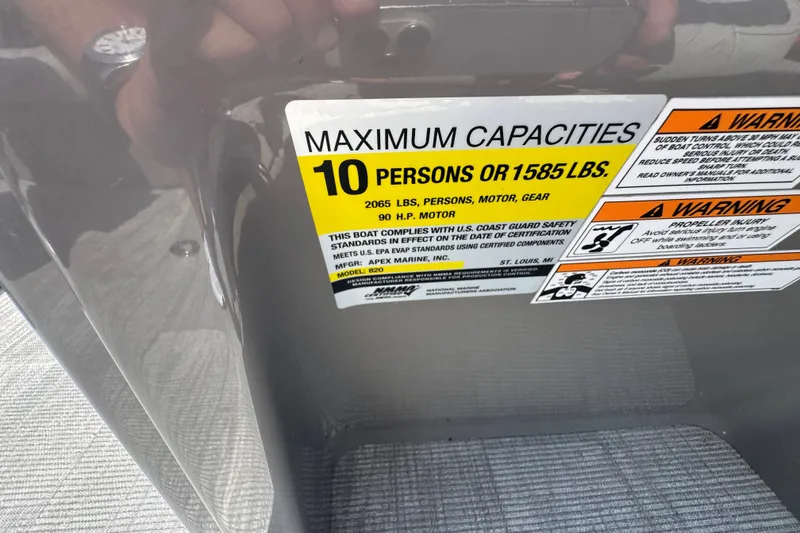 Slide: The Image of 2023 Qwest Lanai 820 capacity label, maximum 10 persons or 1585 lbs, safety warnings. - 18