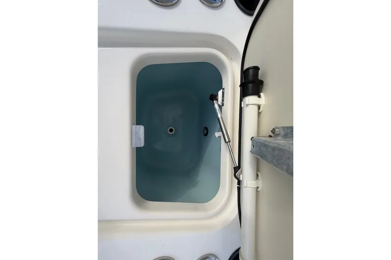 Slide: The Image of Livewell compartment on a 2016 Boston Whaler 240 Dauntless boat. - 11
