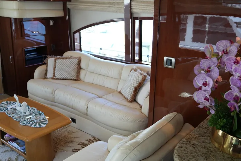 Slide: The Image of Luxurious interior of 2008 Marquis 65 Skylounge yacht with plush seating and elegant decor. - 42