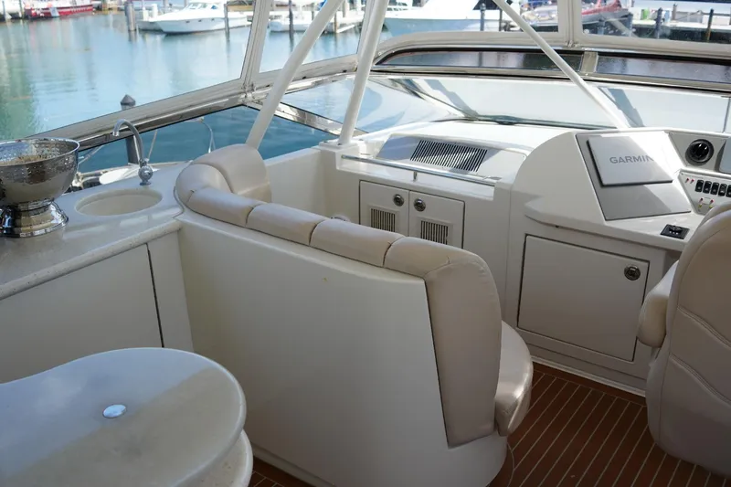 Slide: The Image of Interior of 2008 Marquis 65 Skylounge yacht with helm and seating area. - 32