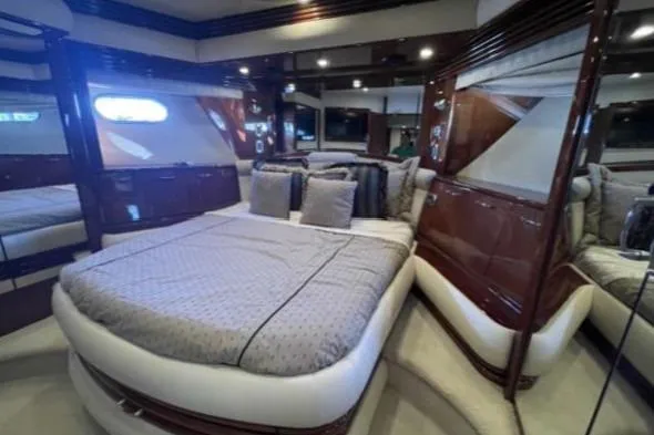 Slide: The Image of Luxurious bedroom interior of 2008 Marquis 65 Skylounge yacht with elegant bedding. - 67