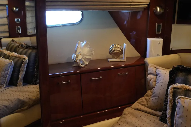 Slide: The Image of Luxurious interior of 2008 Marquis 65 Skylounge yacht with elegant decor and plush seating. - 64