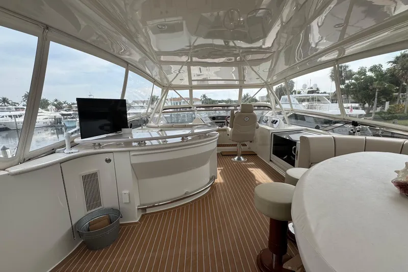 Slide: The Image of Luxurious 2008 Marquis 65 Skylounge yacht interior with elegant seating and panoramic views. - 17