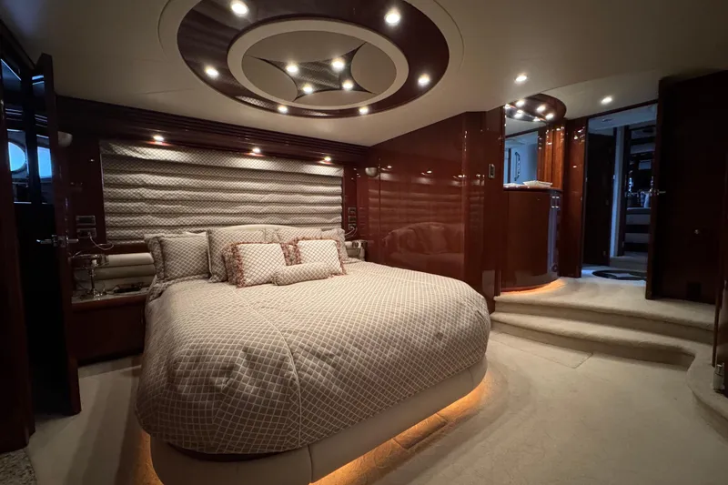 Slide: The Image of Luxurious bedroom interior of 2008 Marquis 65 Skylounge yacht with elegant lighting and decor. - 58