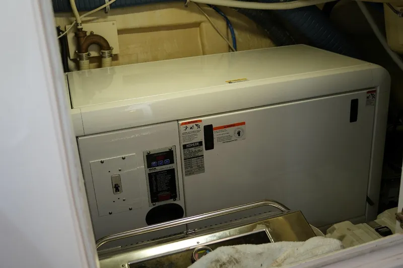 Slide: The Image of Engine room of 2008 Marquis 65 Skylounge yacht with Kohler generator. - 82