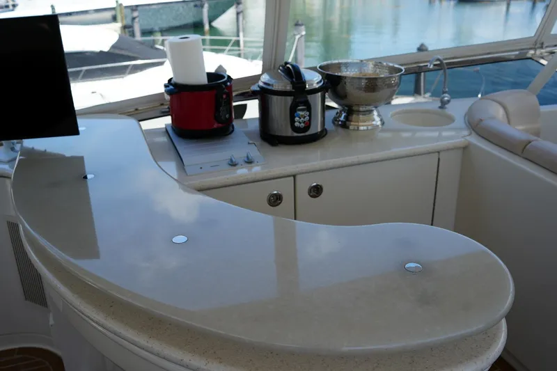 Slide: The Image of Luxurious 2008 Marquis 65 Skylounge yacht interior with modern kitchen amenities. - 30