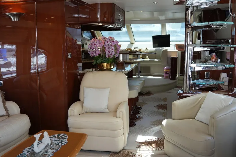 Slide: The Image of Luxurious interior of a 2008 Marquis 65 Skylounge yacht with elegant seating and decor. - 13