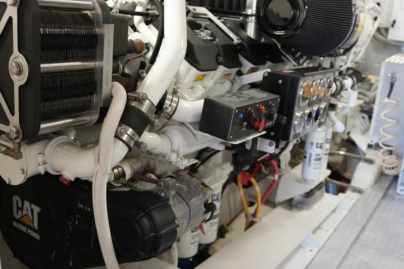 Slide: The Image of Engine room of 2008 Marquis 65 Skylounge yacht, featuring CAT marine power components. - 71