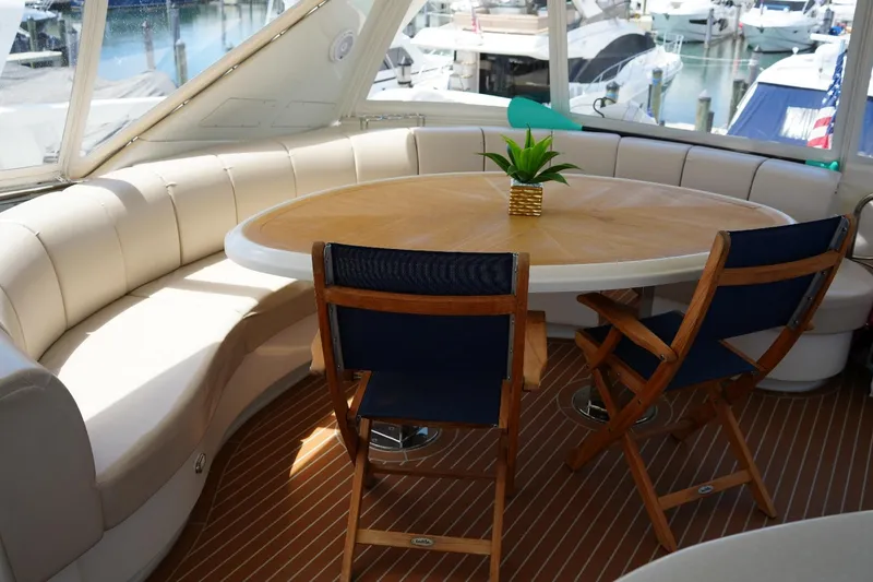 Slide: The Image of Luxurious 2008 Marquis 65 Skylounge yacht interior with elegant seating and table. - 37