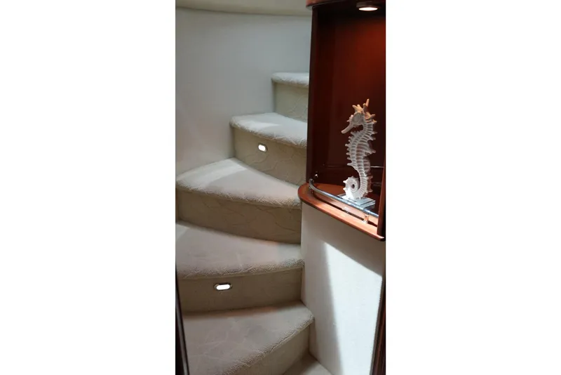 Slide: The Image of Interior staircase of 2008 Marquis 65 Skylounge yacht with seahorse decor. - 55