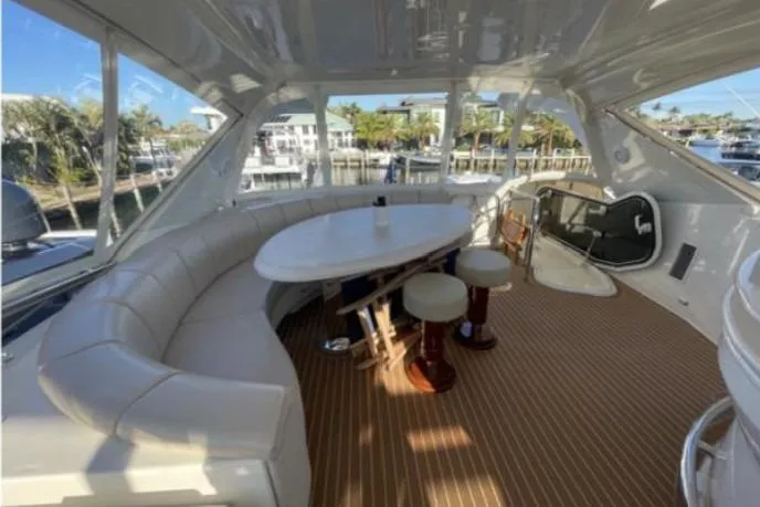 Slide: The Image of Luxurious interior of 2008 Marquis 65 Skylounge yacht with elegant seating and dining area. - 36