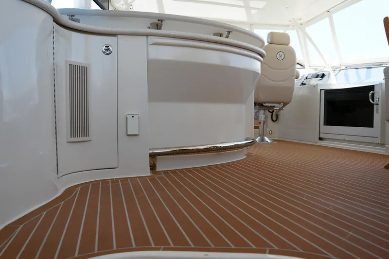 Slide: The Image of Luxurious interior of 2008 Marquis 65 Skylounge yacht with sleek design and modern amenities. - 28
