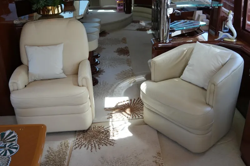 Slide: The Image of Luxurious interior of 2008 Marquis 65 Skylounge with plush beige seating and elegant decor. - 15