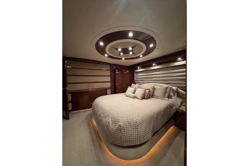 Slide: The Image of Luxurious bedroom interior of 2008 Marquis 65 Skylounge yacht with elegant lighting and decor. - 56