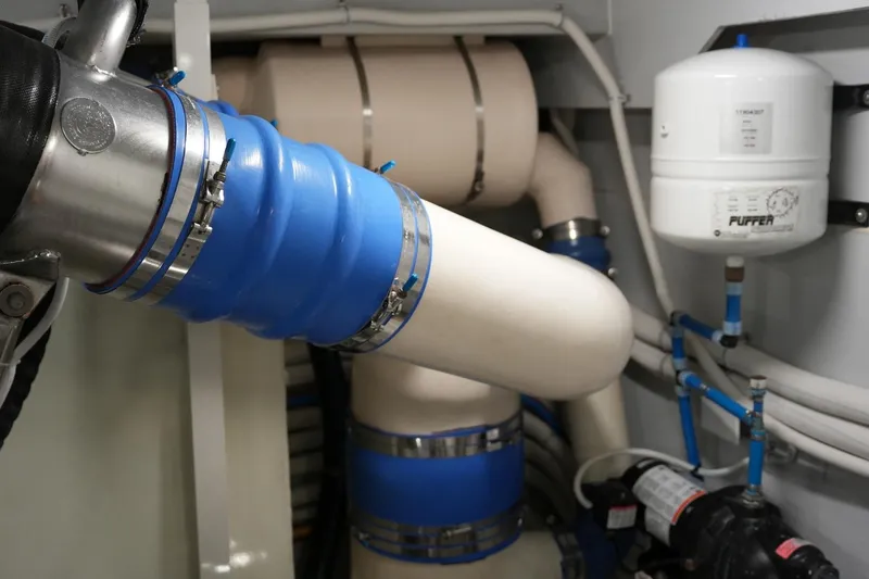Slide: The Image of Engine room of 2008 Marquis 65 Skylounge yacht with pipes and fittings. - 75