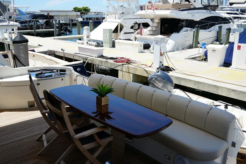 Slide: The Image of Luxury yacht Marquis 65 Skylounge 2008 with elegant deck seating at marina. - 25