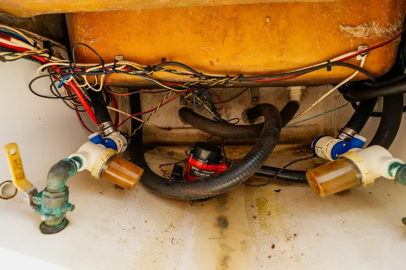 Slide: The Image of Boat engine compartment with wiring and hoses, Dorado 25 SE, 2018 model. - 67