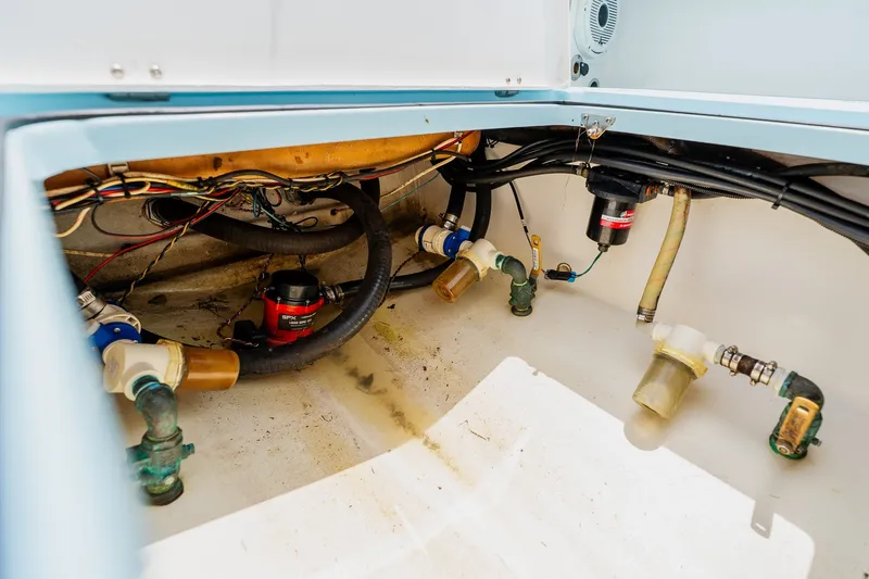 Slide: The Image of Bilge area of 2018 Dorado 25 SE boat with pumps and wiring. - 66