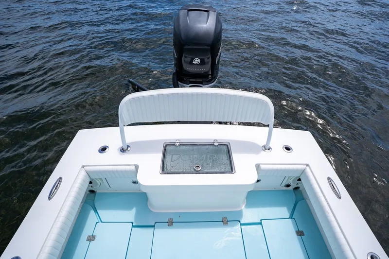 Slide: The Image of 2018 Dorado 25 SE boat with outboard motor on open water. - 62