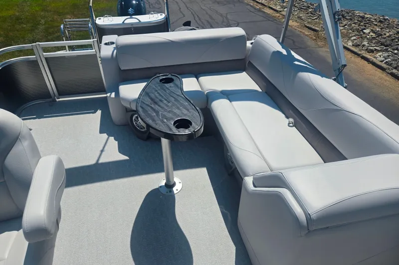 Slide: The Image of 2020 Avalon LSZ Cruise Rear Bench boat with sleek seating and a central table. - 14