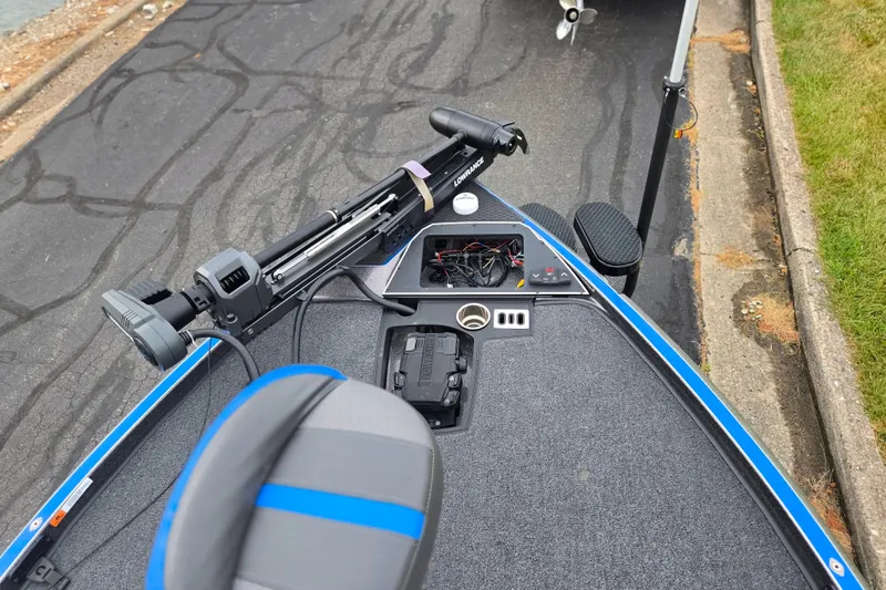 Slide: The Image of 2023 Ranger Z521R boat deck with trolling motor and control panel. - 14