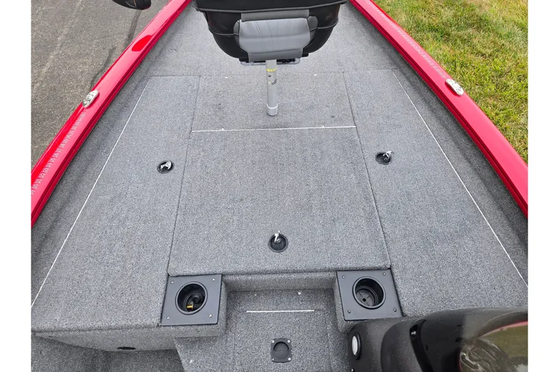 Slide: The Image of 2023 Tracker Pro Team 175 TXW boat deck with gray carpet and seating. - 13