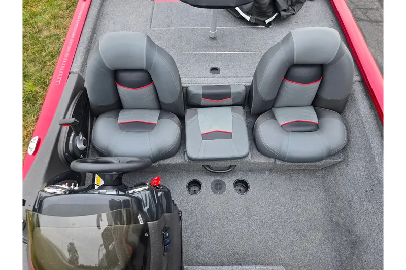 Slide: The Image of 2023 Tracker Pro Team 175 TXW boat interior with gray and red seating. - 18