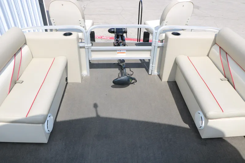 Slide: The Image of Interior view of 2011 Sun Cruiser GS202 pontoon boat with beige seating and red accents. - 20