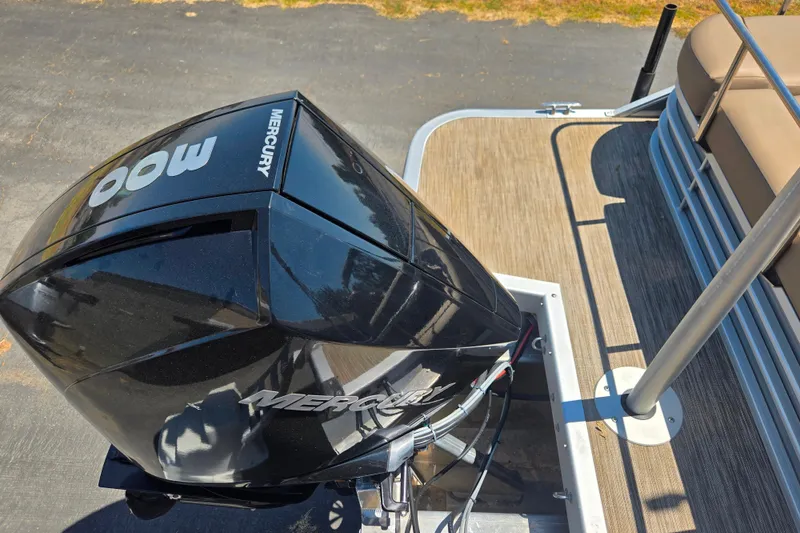Slide: The Image of 2022 Bennington L24 with Mercury 400 outboard motor on deck. - 8