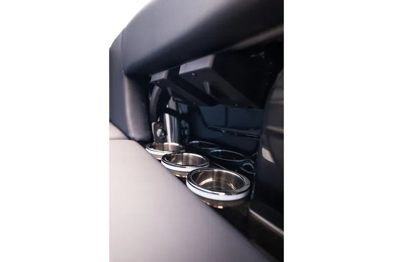 Slide: The Image of 2027 MasterCraft NXT23 interior cup holders, showcasing sleek design and functionality. - 30