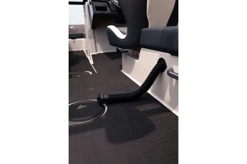 Slide: The Image of Interior of 2027 MasterCraft NXT23 boat showing seating and floor details. - 22