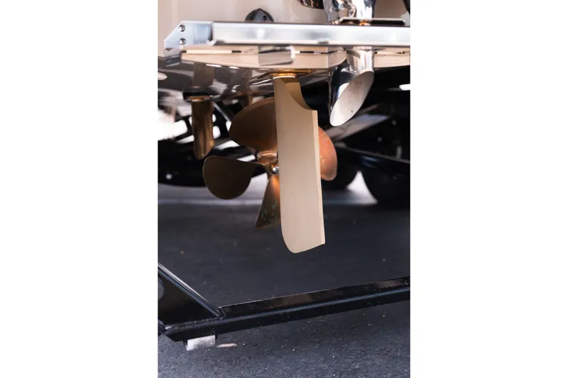 Slide: The Image of Close-up of 2027 MasterCraft NXT23 boat propeller and rudder system. - 7