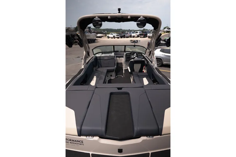 Slide: The Image of 2027 MasterCraft NXT23 boat interior with sleek seating and modern dashboard design. - 16