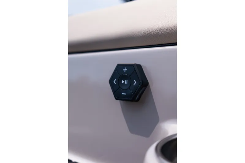 Slide: The Image of Hexagonal control panel on 2027 MasterCraft NXT23 boat dashboard. - 8