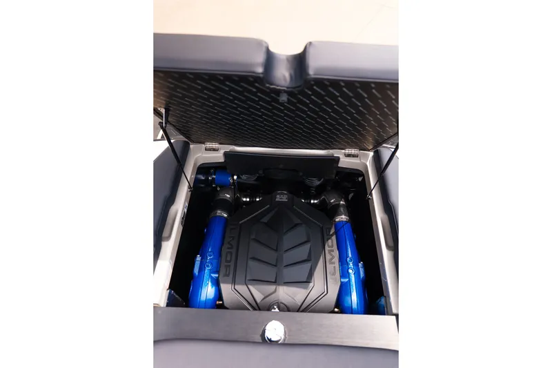 Slide: The Image of Engine compartment of 2027 MasterCraft NXT23 boat, featuring Ilmor engine components. - 35