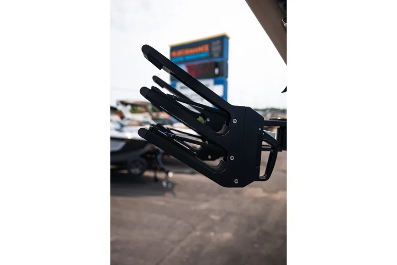 Slide: The Image of Close-up of a 2027 MasterCraft NXT23 boat accessory, showcasing sleek black design. - 37