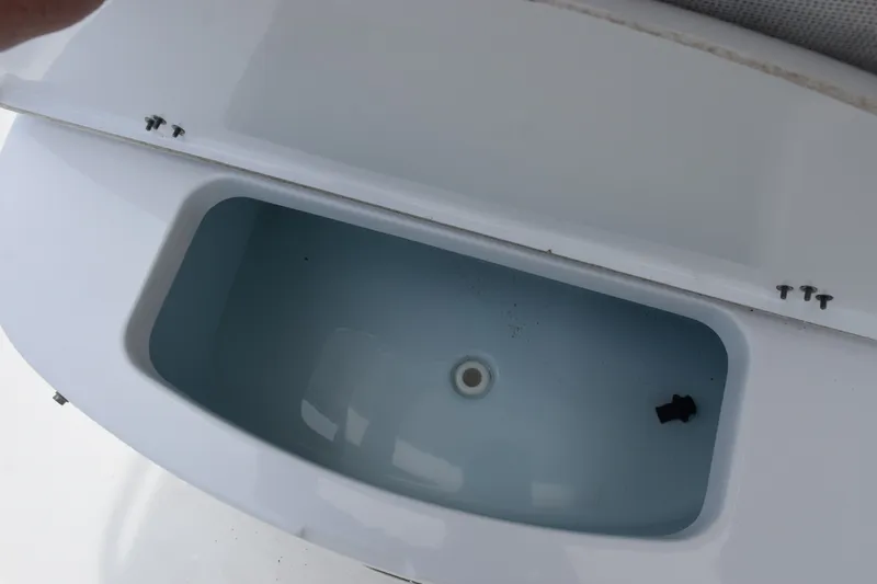 Slide: The Image of Livewell compartment on a 2015 Sportsman Open 212 Center Console boat. - 13