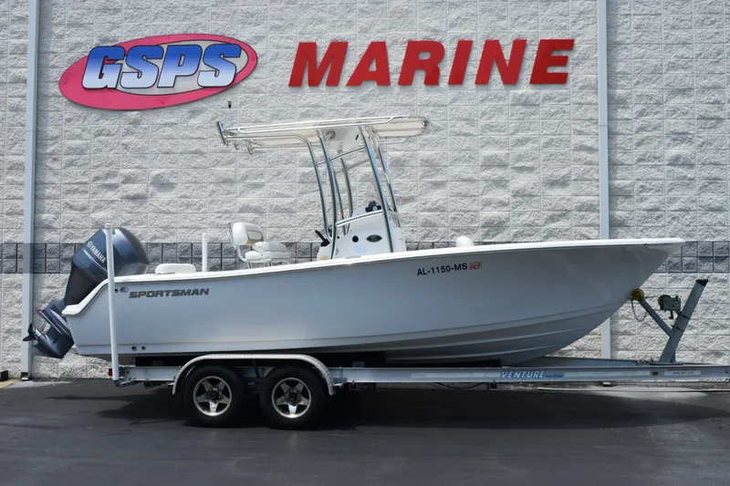 The Image of 2015 Sportsman Open 212 Center Console boat on trailer at GSPS Marine dealership. - 1