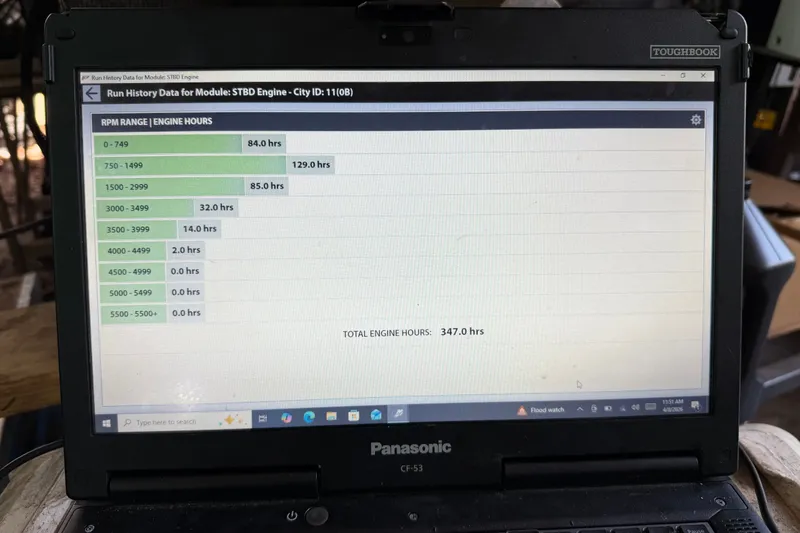 Slide: The Image of Laptop displaying engine run history data for a 2007 Sea Ray 240 Sundancer. - 30