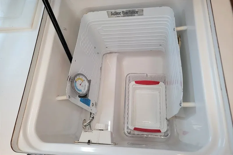Slide: The Image of Refrigeration unit inside a 2003 Beneteau 423 yacht, featuring Adler Barbour components. - 5