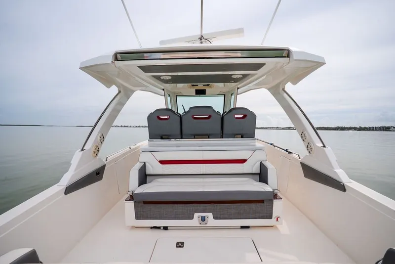 Slide: The Image of 2020 Tiara Sport 34 LS boat interior with modern seating and sleek design. - 21