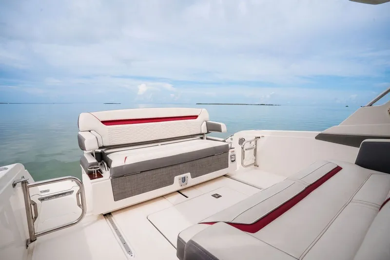Slide: The Image of 2020 Tiara Sport 34 LS boat interior with luxurious seating and ocean view. - 18