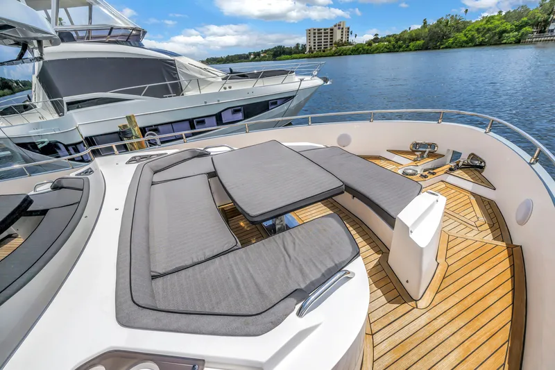Slide: The Image of Luxurious 2022 OKEAN 50 Flybridge yacht with spacious deck and comfortable seating. - 51