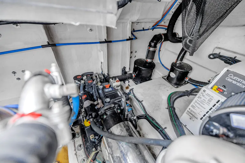 Slide: The Image of Engine room of 2022 OKEAN 50 Flybridge yacht with Cummins generator and wiring. - 101