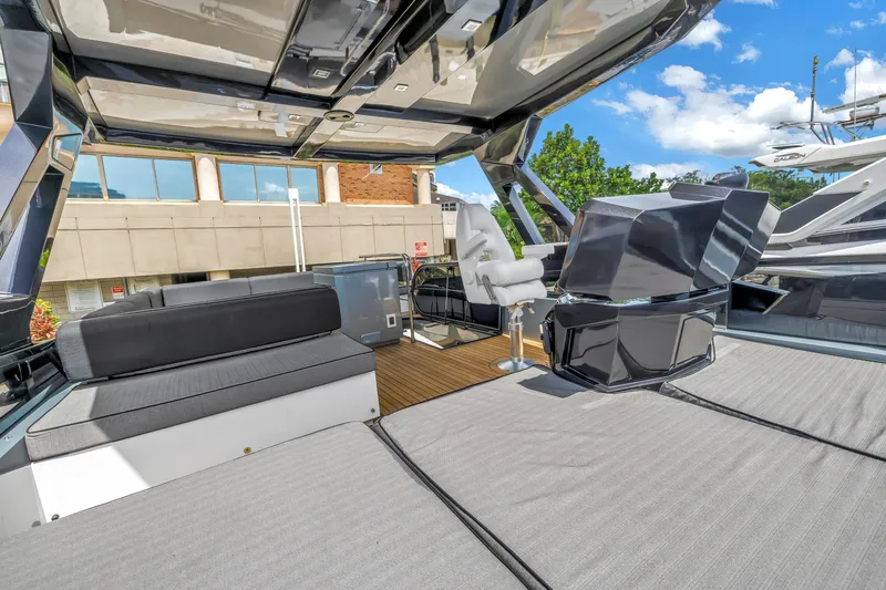 Slide: The Image of Flybridge of 2022 OKEAN 50 yacht with modern seating and helm station. - 73